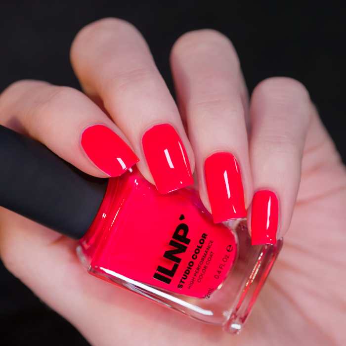 Neon red nail polish