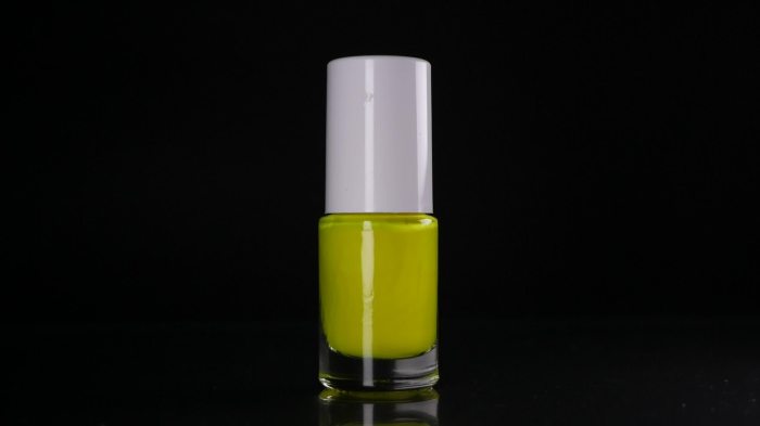 Neon yellow nail polish